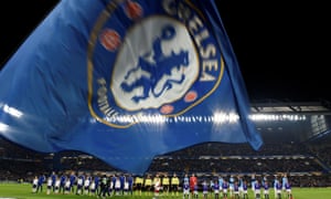 The players line up on the pitch.