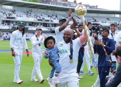 South Africa’s captain Temba Bavuma holds his son Lihle as he shows off the World Test Championship winner’s mace.