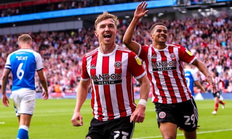 Ben Osborn celebrates as his two goals help Sheffield United to their first Championship victory.