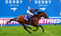 City Of Troy, ridden by Ryan Moore, on their way to winning the Derby.