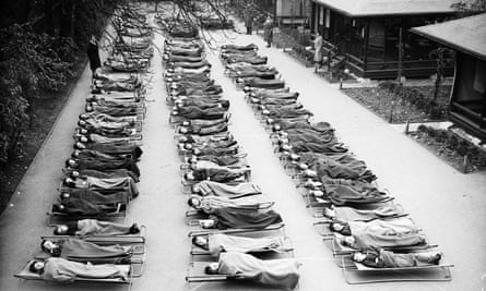 Children suffering from TB (tuberculosis) sleep outside at Springfield House Open Air School, Clapham Common, London, 1932.