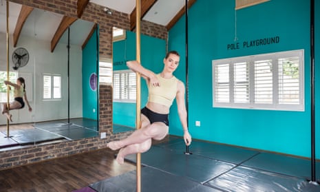 Kaitlin Rawson on a pole at a studio where she trains in Johannesburg, South Africa.