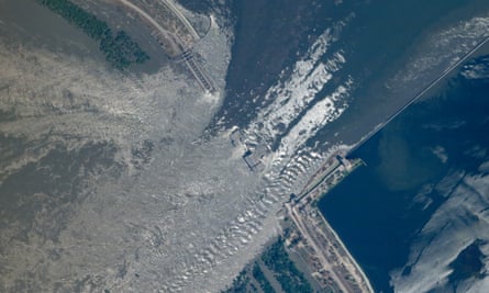 A satellite image provided by Planet Labs PBC showing the damage to the dam.