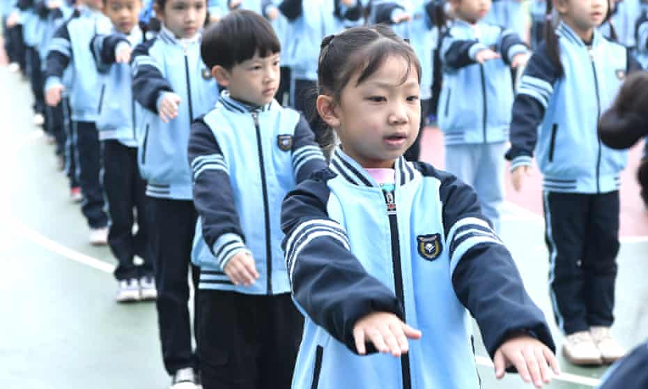 Students exercise at an elementary school in Nanning, capital of Guangxi Zhuang autonomous region.