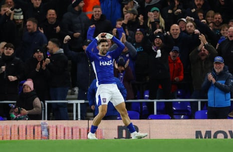 Julio Enciso celebrates scoring a goal in front of cheering Ipswich Town fans