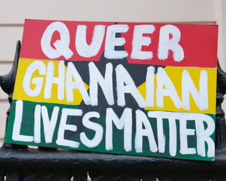 A placard saying ‘Queer Ghanaian Lives Matter’ is placed outside the Ghanaian High Commission in London