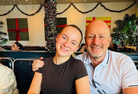 Lucy Harrison with her father, Kris Harrison, who has his arm around her shoulder.