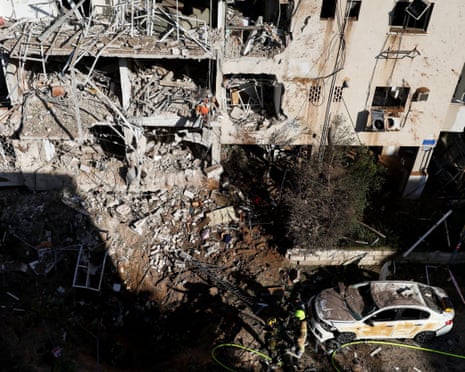 Emergency personnel work at the site