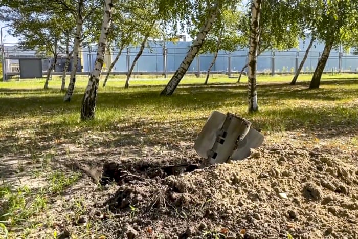 In this handout photo taken from video and released by the Russian defence ministry press service, a rocket fragment is seen near the Zaporizhzhia Nuclear Power Station in occupied Ukraine. Both sides have accused the other of attacking and endangering the power station.
