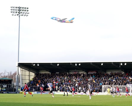 A plane takes off from nearby Glasgow Airport during St Mirren’s 1-0 defeat by Rangers at the SMiSA Stadium in January 2024.