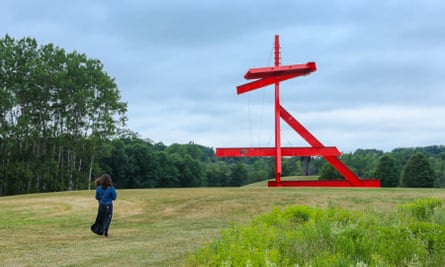 structure of bright red I-beams on grass