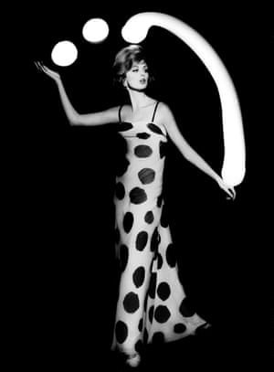 Dorothy Juggling White Light Balls, Paris, 1962 By the early 1960s Klein was the best-known fashion photographer in the world, shooting for Vogue’s American, French, and British editions. He introduced abstract light marks, such as those that he had played with in the darkroom in this striking image.