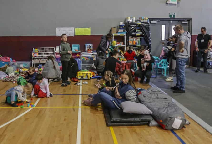 Ukrainian migrant families gather at the refugee camp in the Benito Juarez Sports Unit in Tijuana, Baja California, Mexico.
