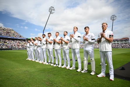 England’s players applaud in memory of Wayne Larkins.