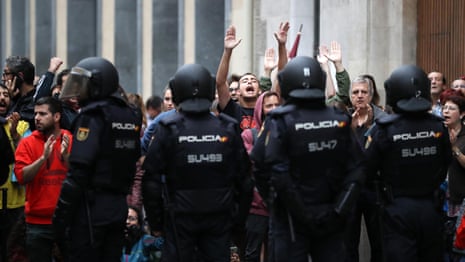 Riot police attack protesters in Girona – video