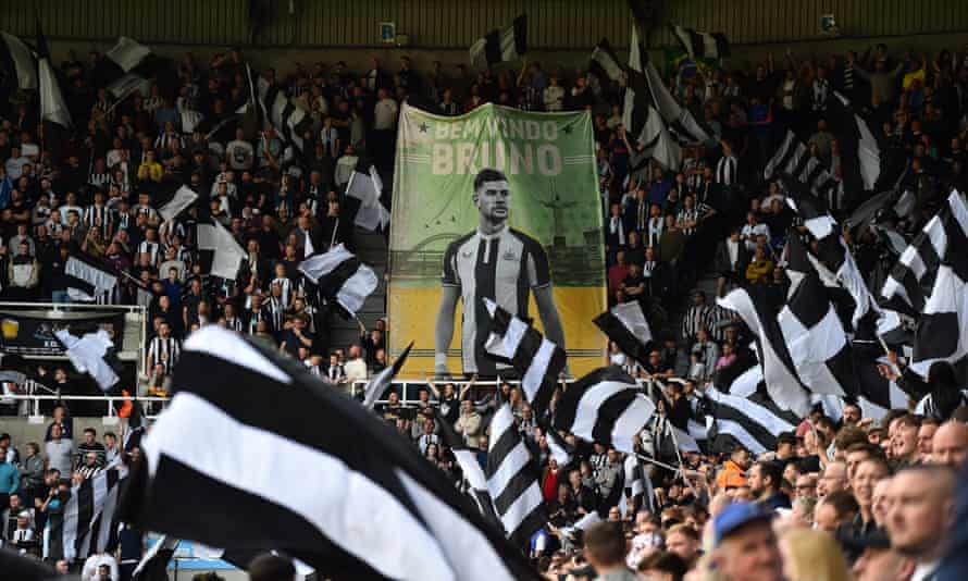 Newcastle fans cheer on their new hero Bruno Guimaraes.