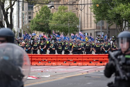 Police are seen during the March for Australia anti-immigration rally in Melbourne on Sunday.
