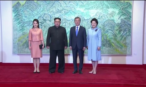 North Korean leader Kim Jong Un and first lady Ri Sol Ju, South Korean President Moon Jae-in and first lady Kim Jung-sook pose for photos during the inter-Korean summit at the truce village of Panmunjom
