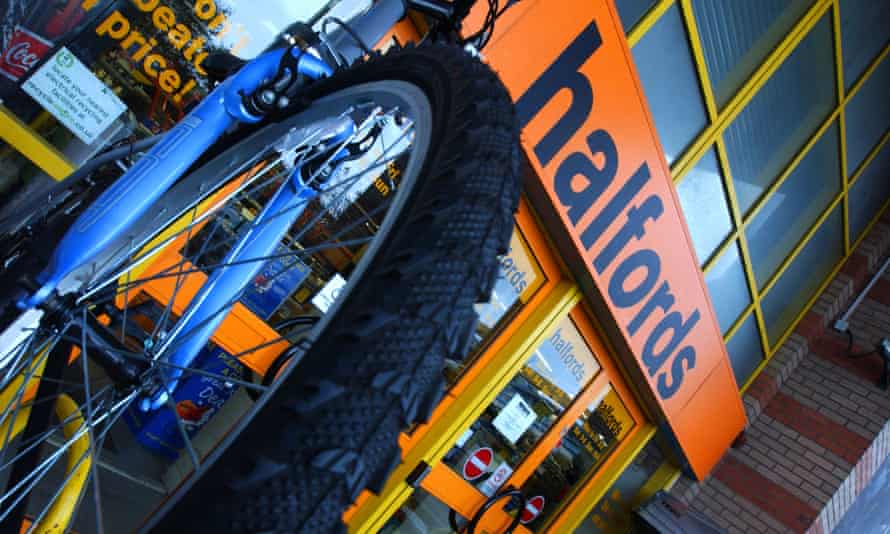 A bike on a display stand outside a Halfords store