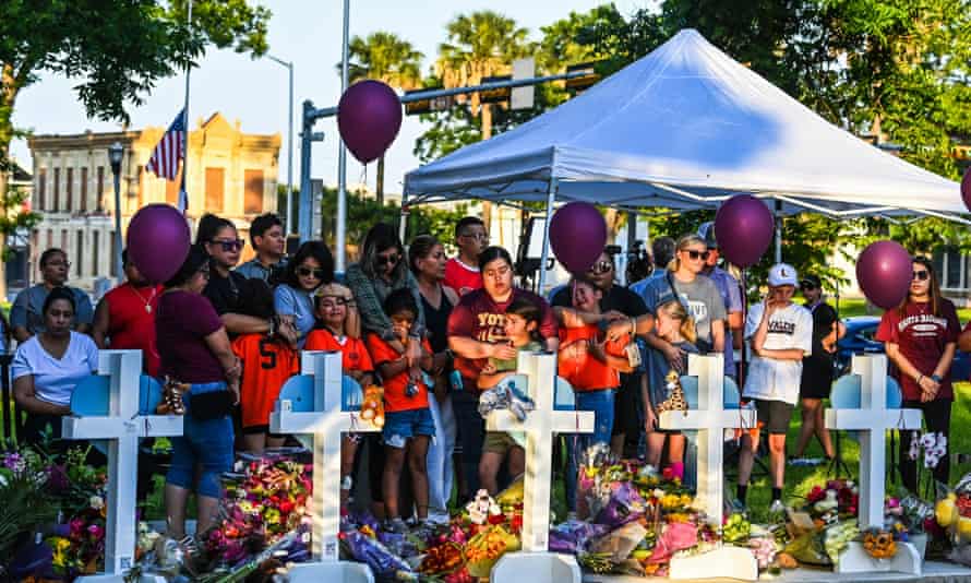 Soccer teammates of Tess Mata, who died in the shooting, visit a makeshift memorial in Uvalde.