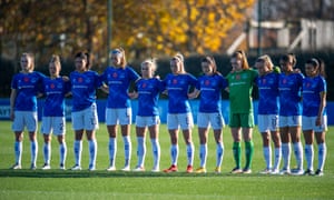 Everton players take part in a silence on Remembrance Sunday before their Barclays FA Women’s Super League match in Liverpool against Manchester United.