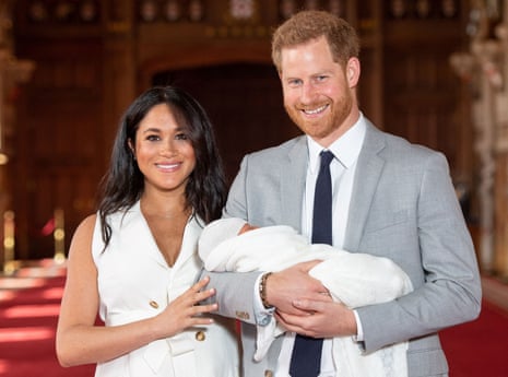 Harry and Meghan present their son.
