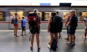 People standing and waiting for the U-Bahn subway train carriage to stop in Vienna, Austria, Europe.