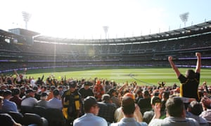 The crowd cheers at the 2019 AFL grand final between the Richmond Tigers and the GWS Giants at the MCG in Melbourne