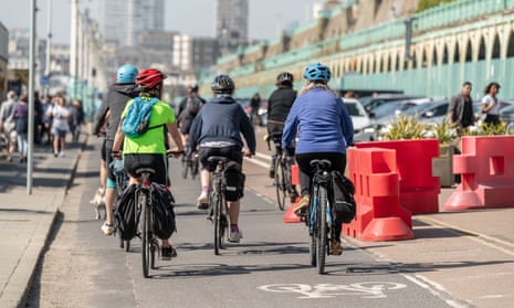 Cyclists on a new wider cycle lane on Madeira Drive, Brighton.