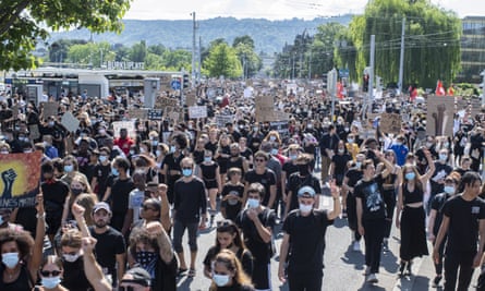 Protesters march in Zurich in June this year demanding action against racism