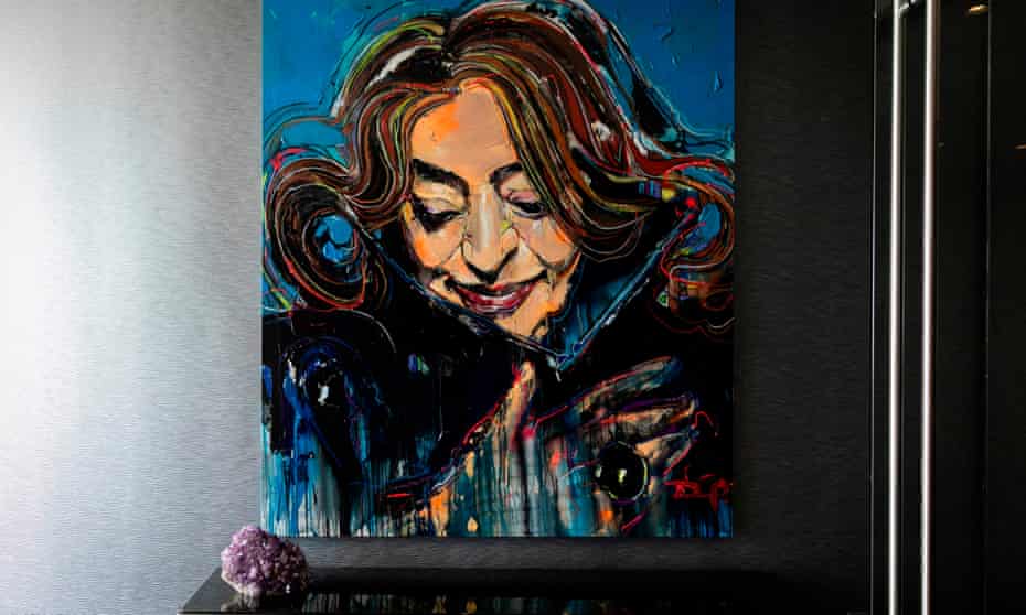 A portrait by David Banegas of Zaha Hadid in the sky lounge of her One Thousand Museum building in Miami.