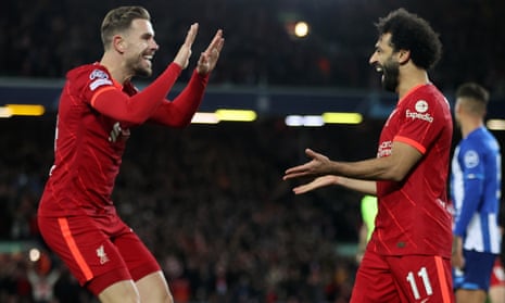 Mohamed Salah (right) celebrates after scoring Liverpool's second goal with Jordan Henderson.