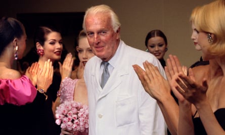 Givenchy is applauded by his models after presenting his final High Fashion collection in 1995.