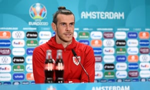 Gareth Bale of Wales speaks to the media on Friday afternoon. Fizzy drinks out of focus.