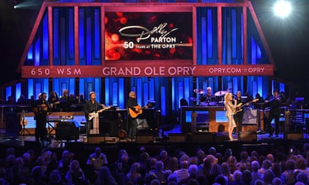 Dolly Parton performs at the Grand Ole Opry in Nashville.
