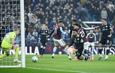 Aston Villa’s Douglas Luiz scores their first goal.