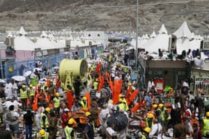 Muslim pilgrims and rescuers gather around the victims of the stampede in Mina, Saudi Arabia.