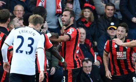 Harry Arter, right, reacts to being caught by an elbow while Moussa Sissoko pleads innocence. The Tottenham player was not sent off.