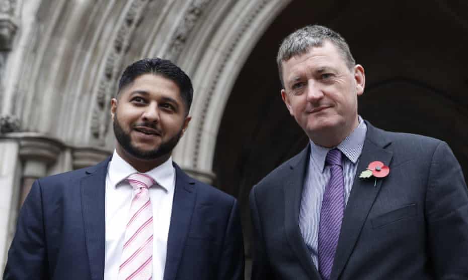 Former Uber drivers Yaseen Aslam, left, and James Farrar outside the Royal Courts of Justice ahead of the landmark ruling over employment rights in London