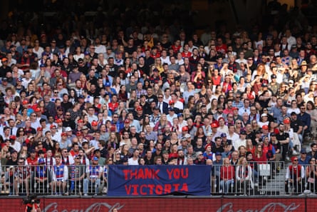 Fans at the 2021 AFL grand final in Perth with a sign saying ‘thank you Victoria’