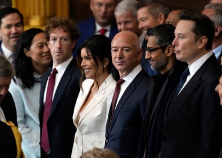 Mark Zuckerberg, Jeff Bezos, Sundar Pichai and Elon Musk stand amid a crowd; the men are dressed formally in dark suits and ties