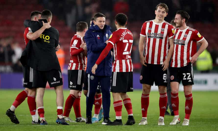 Paul Heckingbottom enjoys Sheffield United’s win at home to QPR with his players.