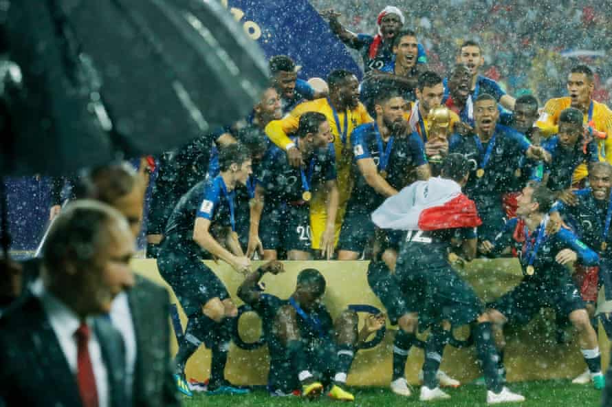 FIFAPRO Tom Jenkins’s best sports photos of 2018 19 Just as Hugo Lloris and the rest of the French team lift the trophy, President Vladimir Putin and his entourage walk in front of the photographers after the France v Croatia FIFA World Cup 2018 final