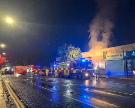 Fire Brigade attends fires at shop units on Shankill Road, Belfast.