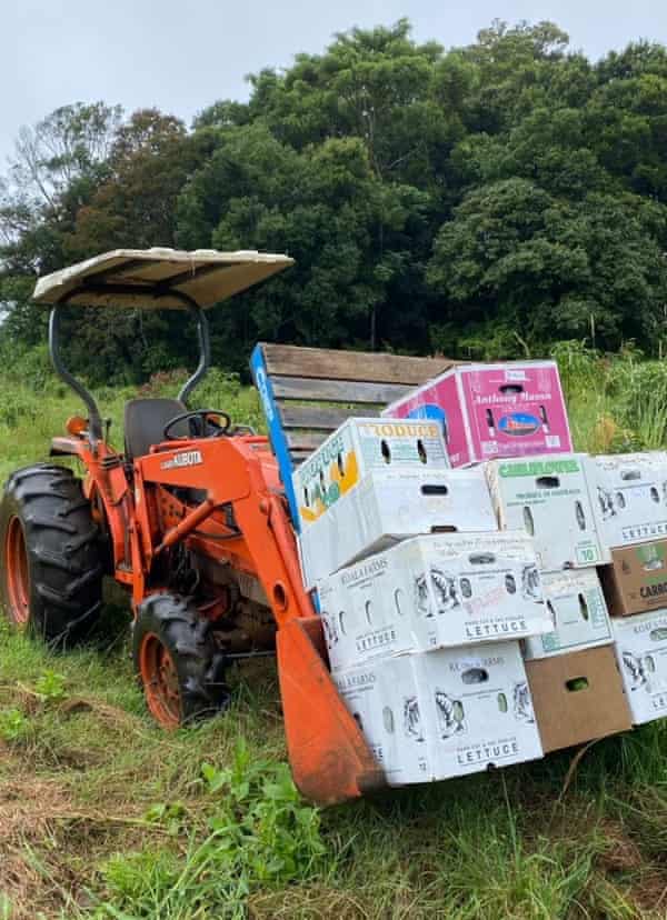 Produce boxes on a tractor on Boon Luck Farm