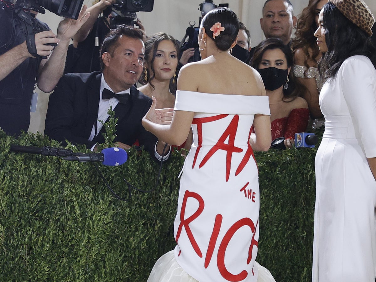 Medium is the message': AOC defends 'tax the rich' dress worn to Met Gala | Alexandria Ocasio-Cortez | The Guardian Medium is the message': AOC defends 'tax the rich' dress worn to Met Gala | Alexandria Ocasio-Cortez | The Guardian
