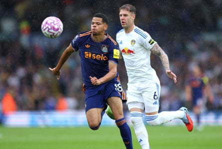 Will Osula (left) and Joe Rodon tussle for possession.