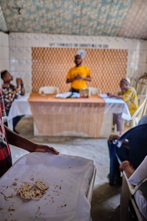 The blessing of the bread. Aaron Hakodesh Synagogue in Port Harcourt, Nigeria