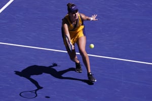 Belinda Bencic returns a shot during her victory over Martina Trevisan.