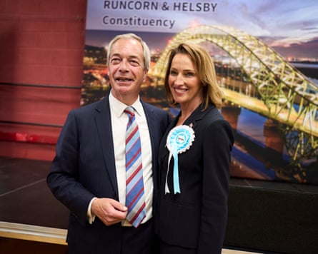 Nigel Farage celebrates with Reform’s candidate Sarah Pochin after it defeated Labour by six votes to win the Runcorn and Helsby byelection.